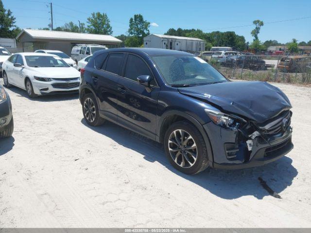  Salvage Mazda Cx